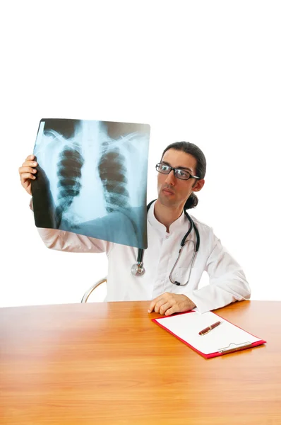 Male doctor looking at x-ray image — Stock Photo, Image