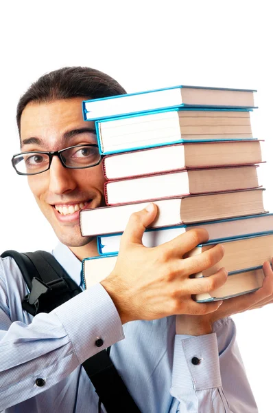 Estudante com pilha de livros sobre branco — Fotografia de Stock