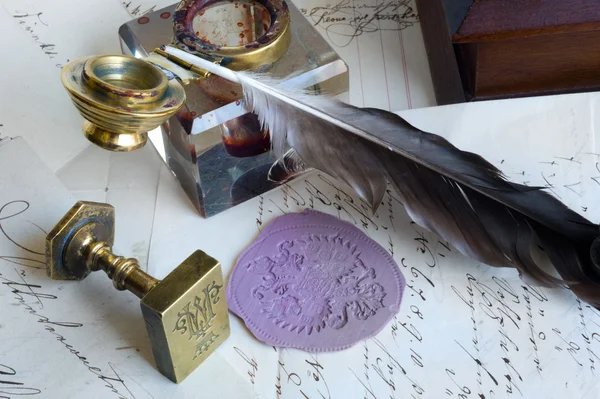 Old letters,stamps and feather — Stock Photo, Image