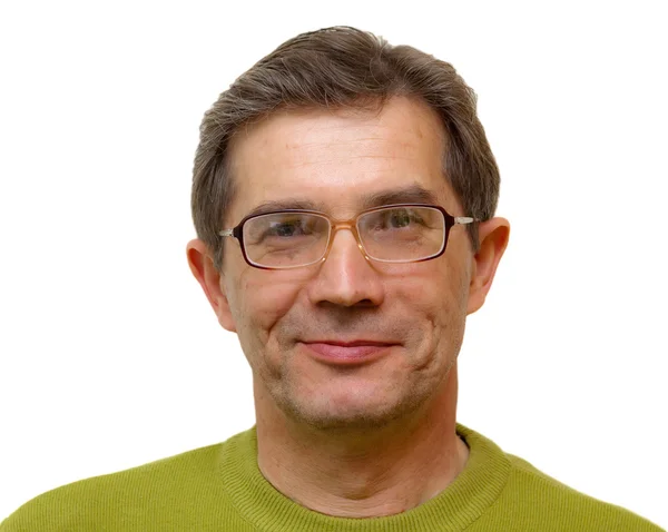 Ein lächelnder Mann auf weißem Hintergrund in grüner Jacke — Stockfoto