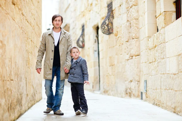 Father and son outdoors in city — Stock Photo, Image