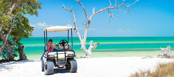 stock image Golf cart at tropical beach