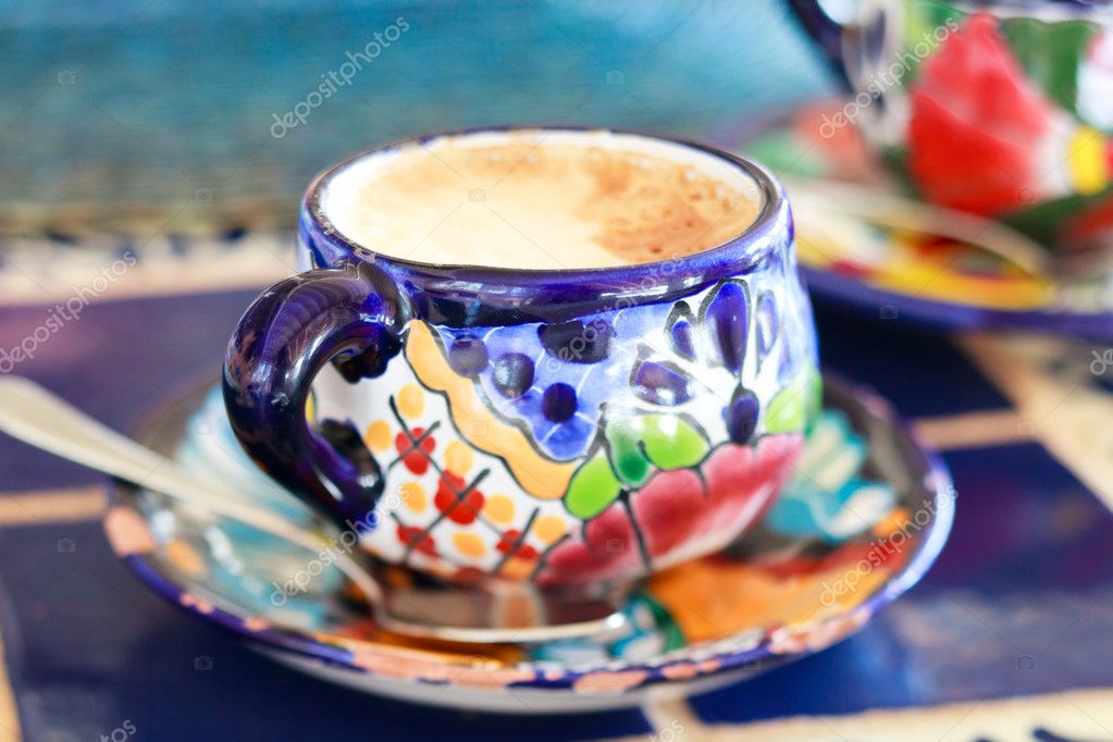 https://static6.depositphotos.com/1001001/618/i/950/depositphotos_6180539-stock-photo-cappuccino-served-in-colorful-cup.jpg