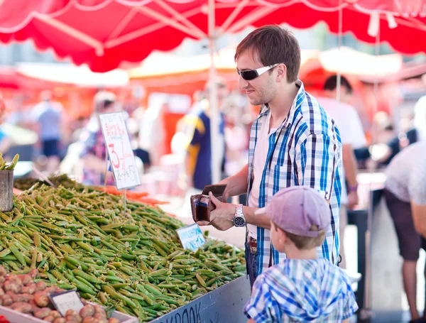 Father and son at market — Stock Photo, Image