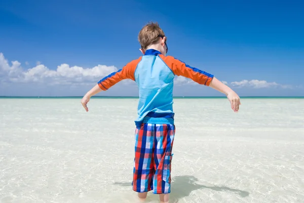 Little boy in shallow water — Stock Photo, Image