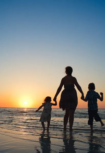 Family at sunset — Stock Photo, Image