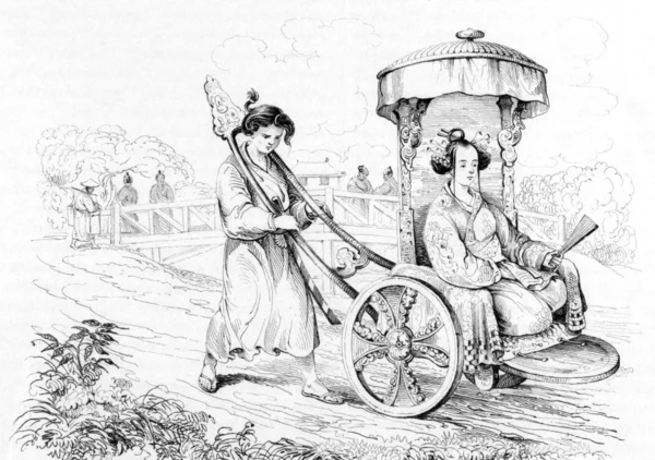Японская леди в колеснице — стоковое фото