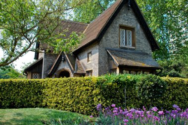Old English style cottage in Hyde Park, London clipart
