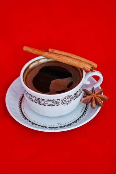 Cup of coffee isolated on red — Stock Photo, Image