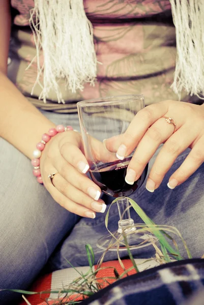 stock image Girl holding a glass of wine