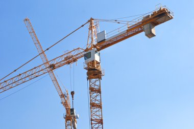 Tall yellow tower crane clipart