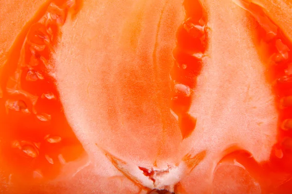 Red tomato slice macro — Stock Photo, Image