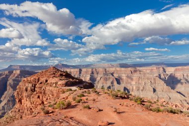 Grand canyon with blue sky and clouds clipart