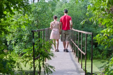 Husband with his wife on the bridge