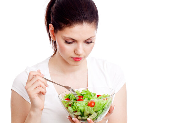 Young woman with healthy salad.