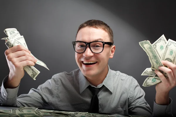 Счастливый человек с деньгами — стоковое фото