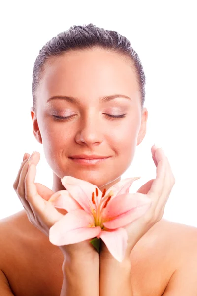 Beautiful woman with flower with hands. — Stock Photo, Image