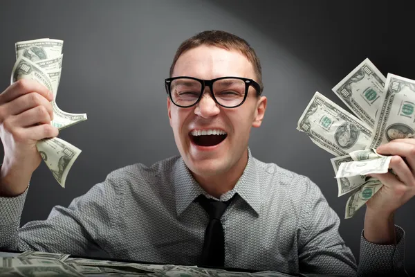 Para ile mutlu bir adam — Stok fotoğraf