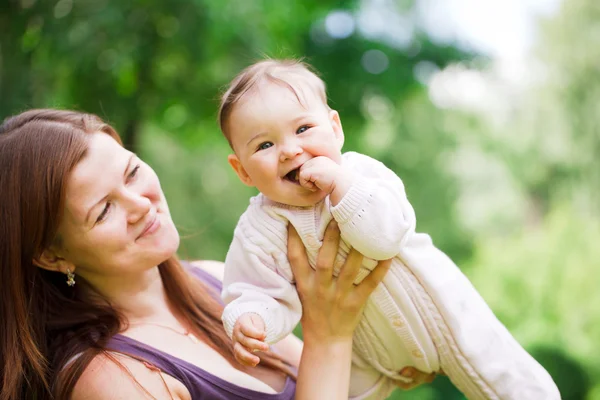 Mother with baby at outdoors — Stock Photo, Image