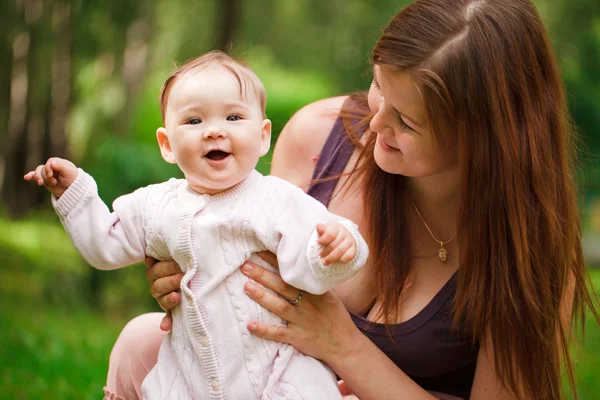 Mother with baby at outdoors — Stock Photo, Image