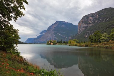 Toblino lake in the northern Italy clipart