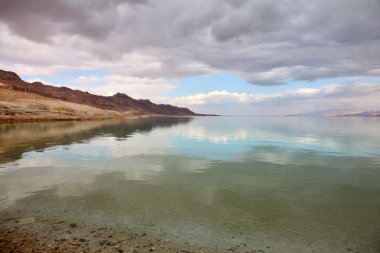 Magical winter sunset at the Dead Sea clipart