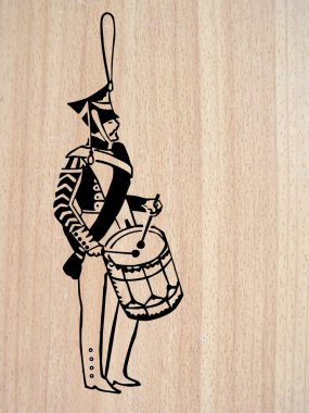Vector illustration of the drummer on wood background clipart