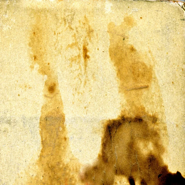 Темное пятно на старой бумаге — стоковое фото