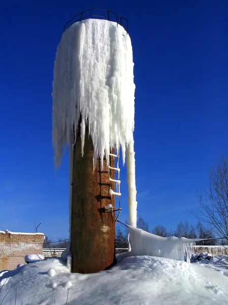 Icicles on water tower — Stock Photo, Image