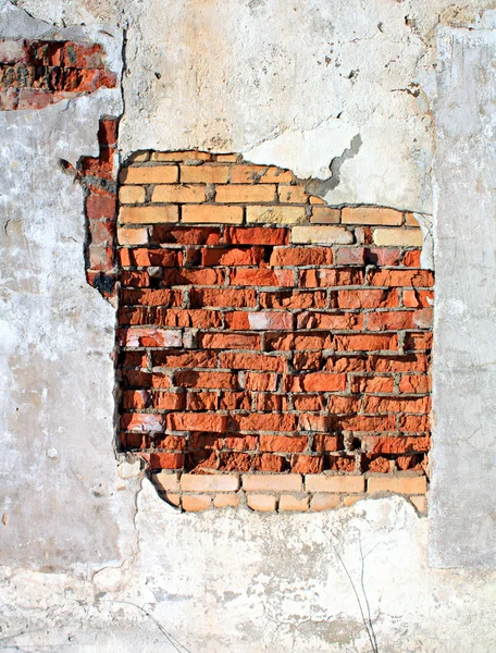 Ziegelmauer in die Jahre gekommen — Stockfoto