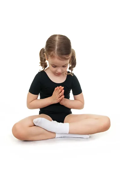 Flicka i lotusställning. barn yoga. — Stockfoto