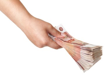 Stack of five thousandth bills in the female hand. clipart