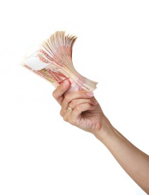 Stack of five thousandth bills in the female hand. clipart