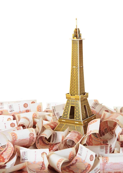 Model Eiffelova věž v pozadí ruských bankovek — Stock fotografie