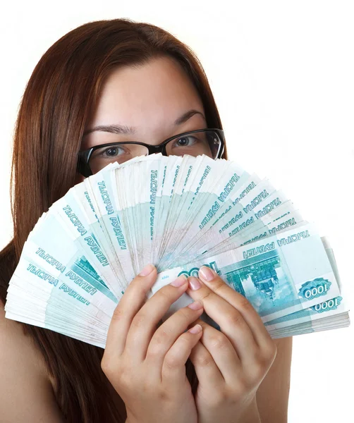 Thoughtful Girl with a Fan thousands of denominations. — Stock Photo, Image