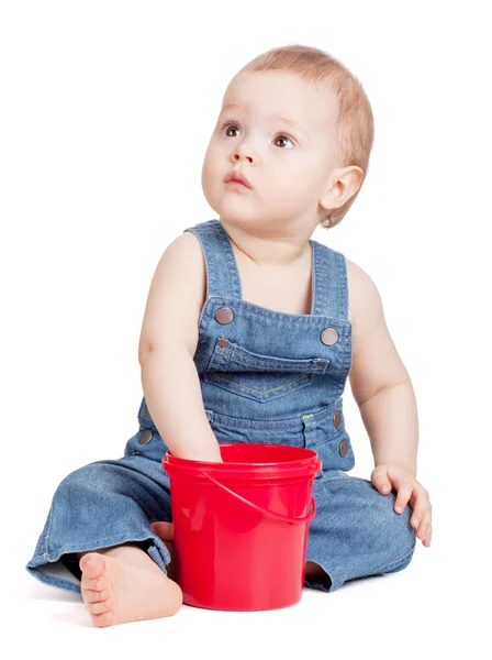 Small baby worker with toy bucket — Stock Photo, Image