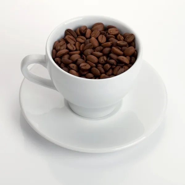 Filiżanka kawy z fasolą — Zdjęcie stockowe