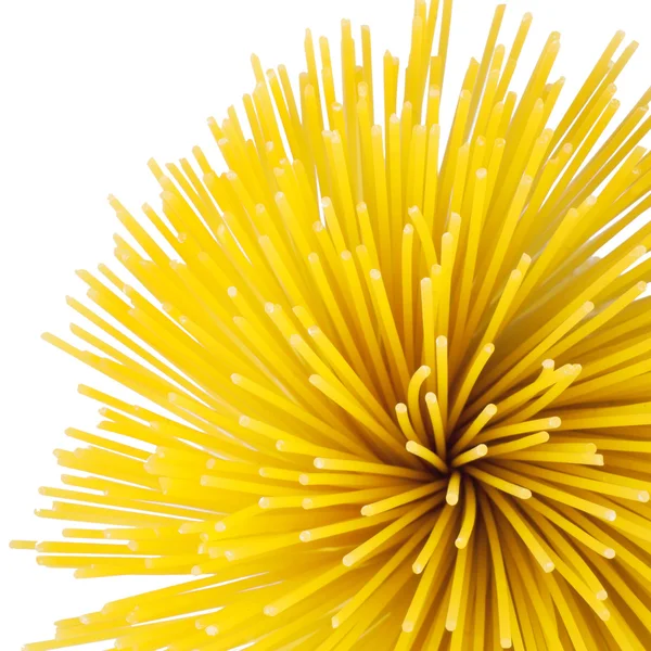 Bunch of spaghetti isolated on white. Top view. — Stock Photo, Image