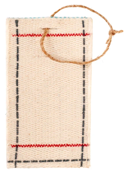 Etiqueta de telas en blanco atada con una cuerda —  Fotos de Stock