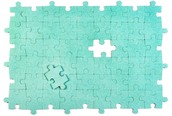 Puzzle verde con pezzo mancante — Foto Stock