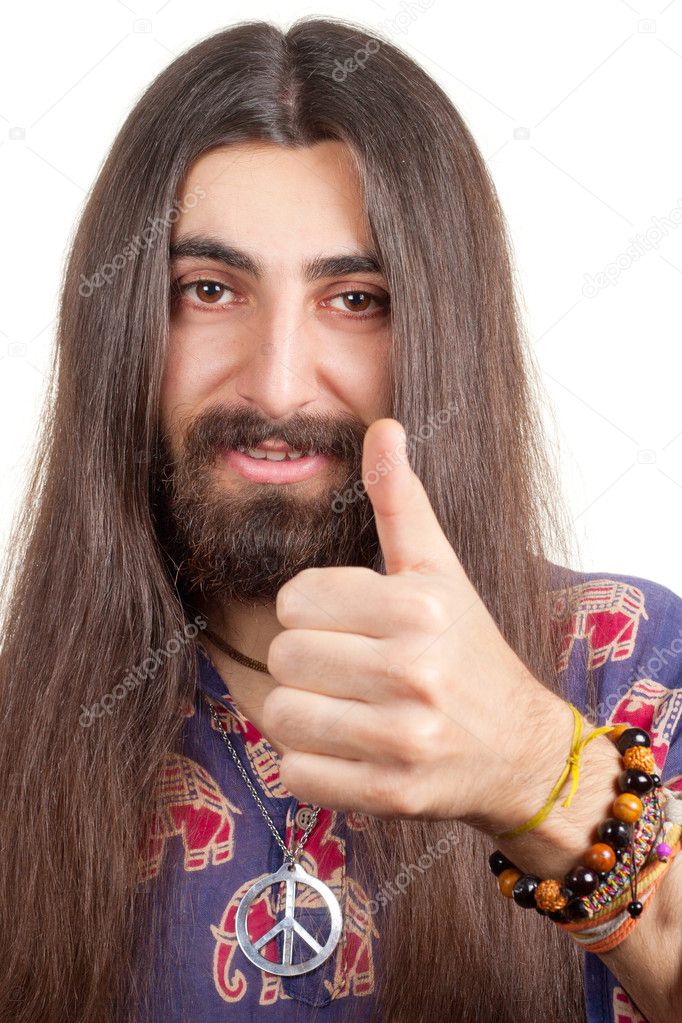Friendly hippie with long hair making agree sign