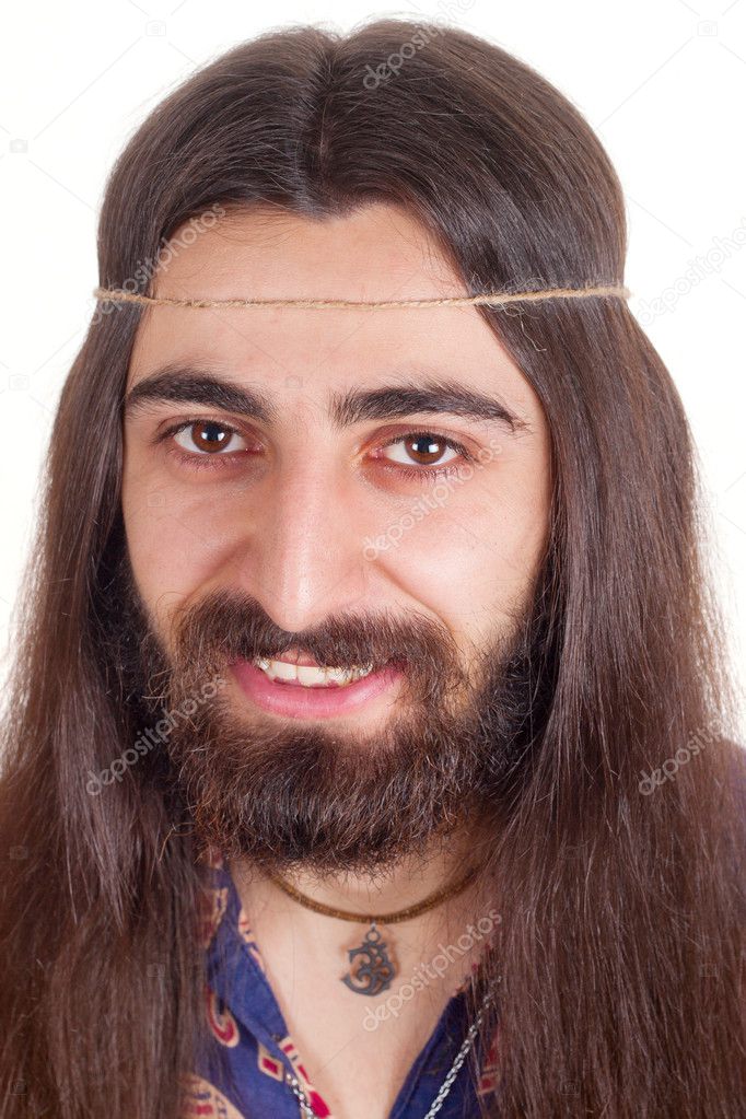 Long-haired handsome smiling hippie man