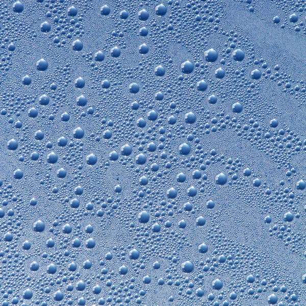 Water drops on a grey-blue background — Stock Photo, Image
