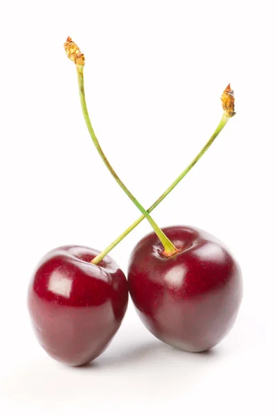 Two red cherries isolated on a white background — Stock Photo, Image