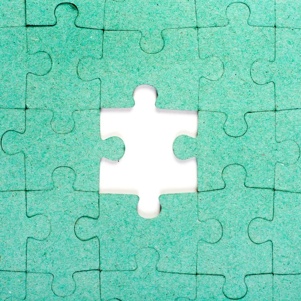 Puzzle verde con pezzo mancante — Foto Stock