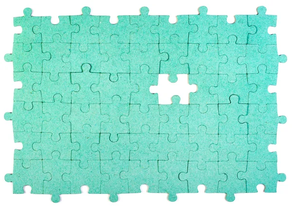 Puzzle verde con la pieza que falta — Foto de Stock