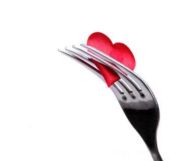 Red plug and knife near heart symbol clipart