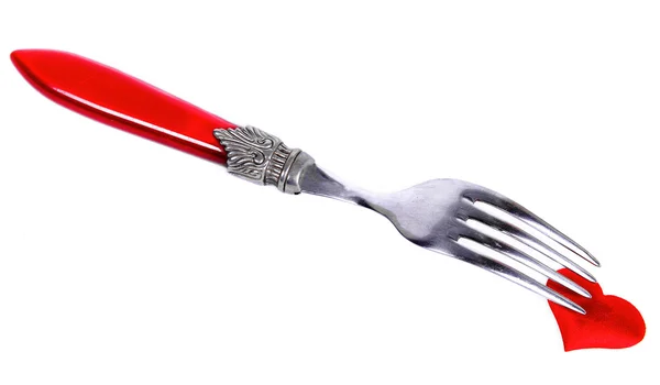 Piros dugó és kés közelében szív szimbólum — Stock Fotó