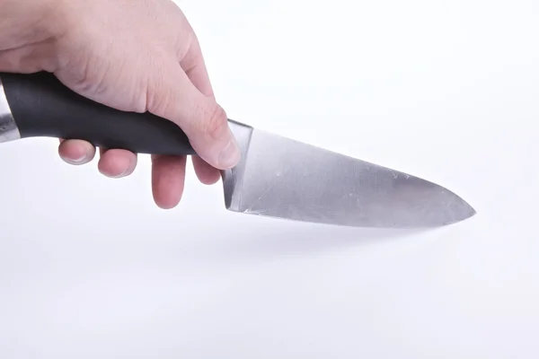 Hand som håller en kniv isolerad på vit — Stockfoto