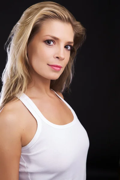 Photo of beautiful woman with blond hair on black studio background. — Stock Photo, Image